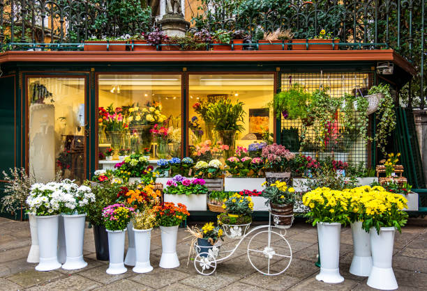 Florist preparing corporate flower displays for local business customers